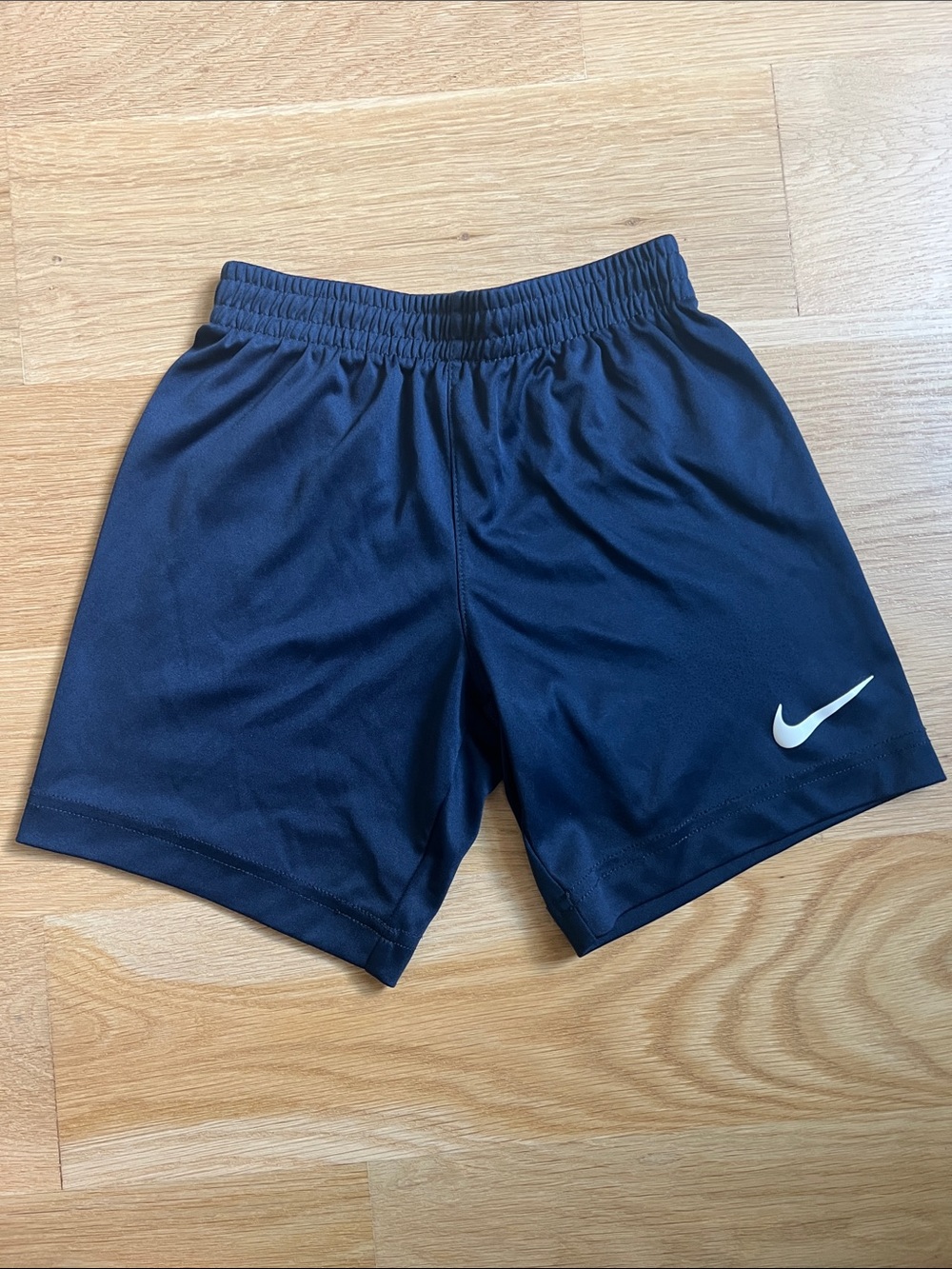 Nike kids Navy Blue Athletic Shorts with White Swoosh